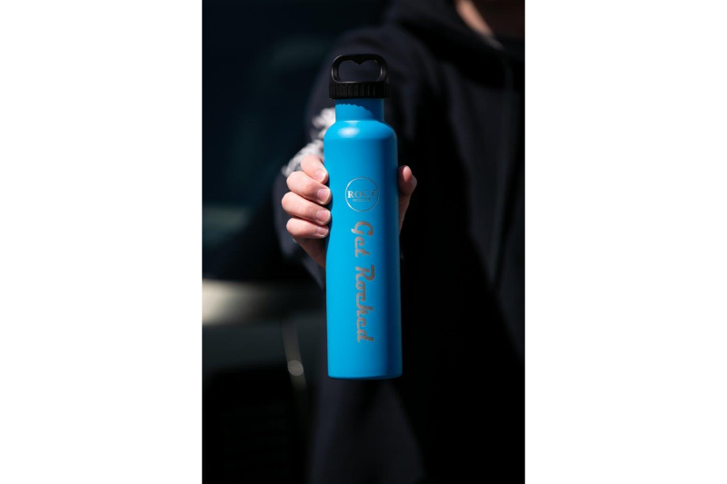 Hand Holding Crater Blue 25 oz Water Bottle