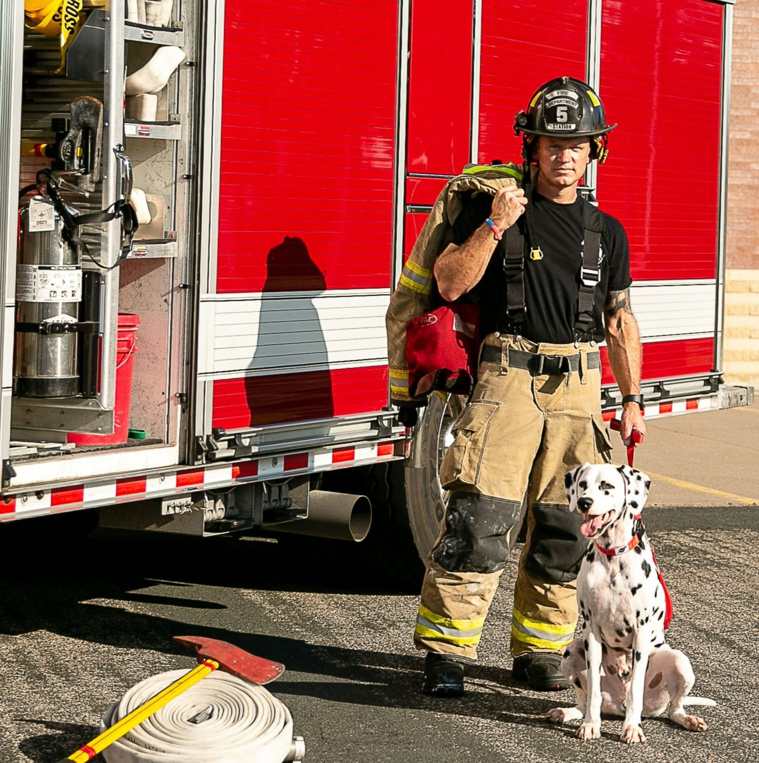 firefighter with dog 